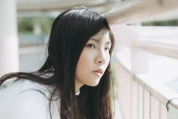 close-up of thoughtful young woman
