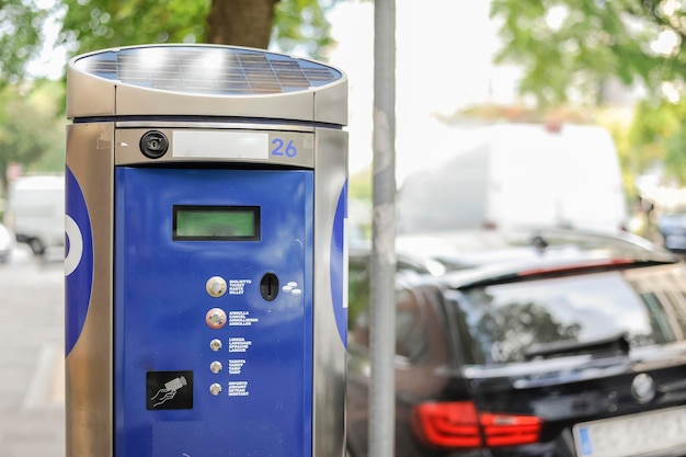 close up of ticket machine at sidewalk