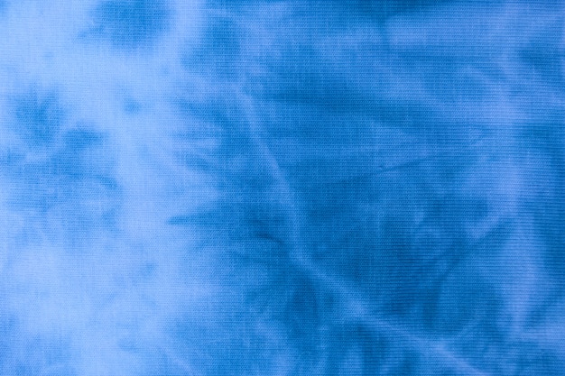 Close up tie dye fabric pattern. Hand made texture.