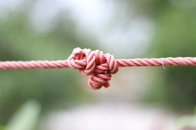 Photo close-up of tied rope outdoors