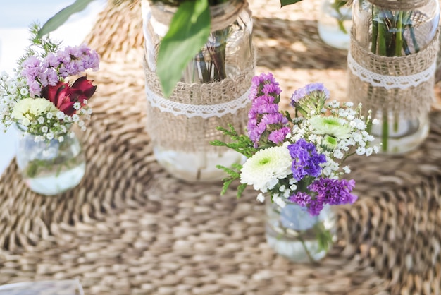 Close-up of tiny bouquets on a restaurant table