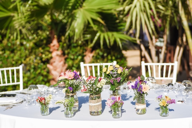 Close-up of tiny bouquets on a restaurant table