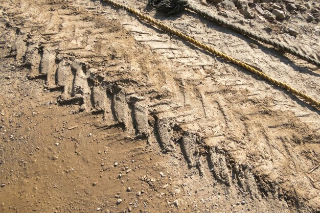 Photo close-up of tire print on the ground