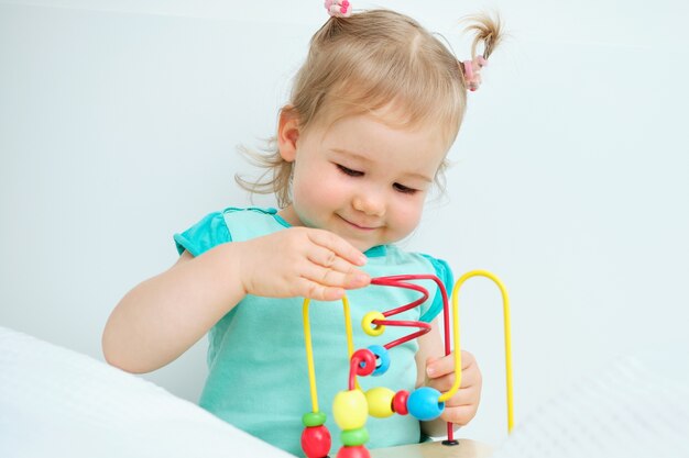 Close up on toddler playing an educational game