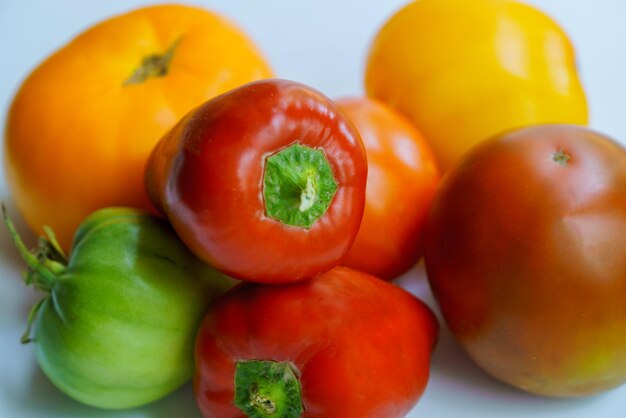 Close-up of tomatoes against orange background