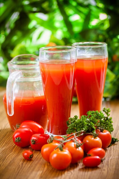 Close-up of tomatoes in glass on table