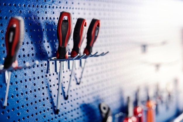 Close up of tools and screwdrivers on the tool board