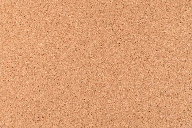Photo close up and top view of  brown cork board for background