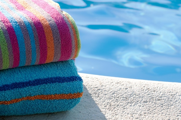 Photo close-up of towels at poolside