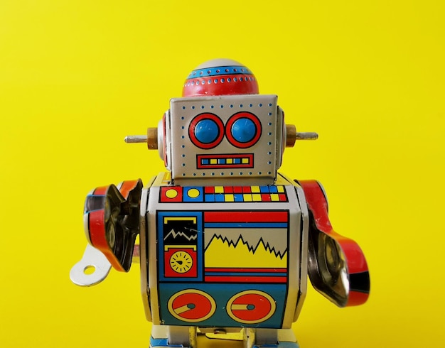 close-up of toy against yellow background