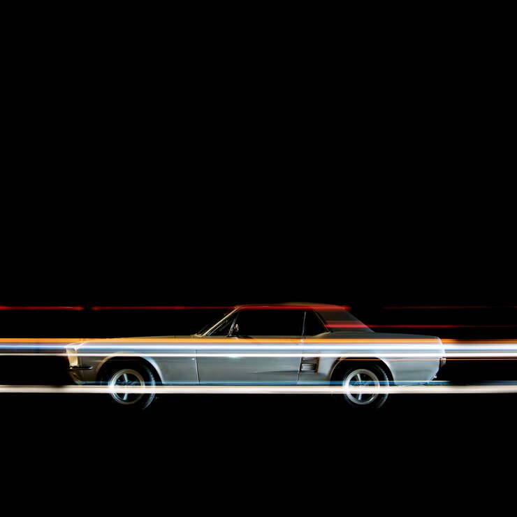 Photo close-up of toy car against black background