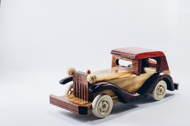 Close-up of toy car against white background