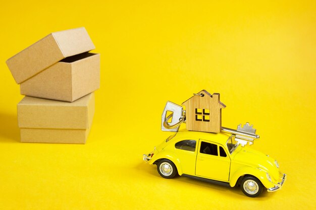 Close-up of toy car against yellow background