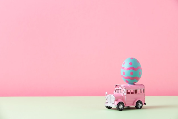 Photo close up on toy car with easter eggs