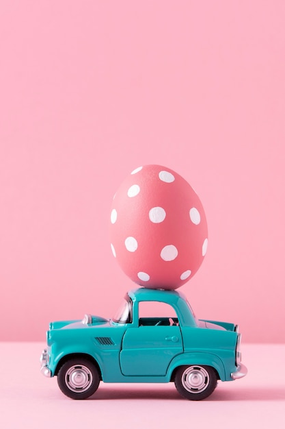 Close up on toy car with easter eggs