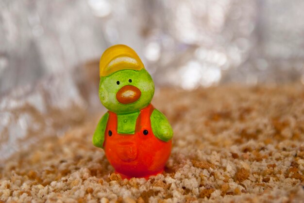 Photo close-up of toy figurine on land