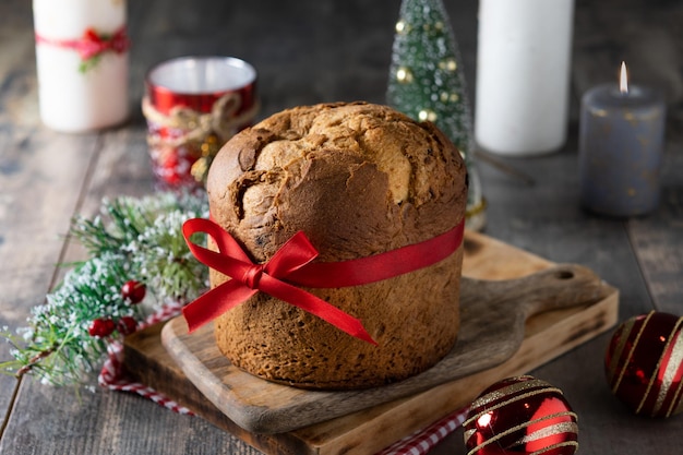 Close up of traditional Christmas panettone on wooden table