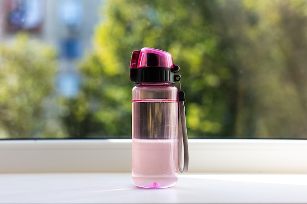 Close-up of transparent water bottle for kids.