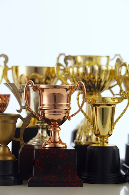 Photo close-up of trophies against white background