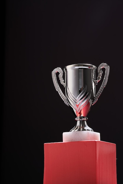 Close up trophy on the black background