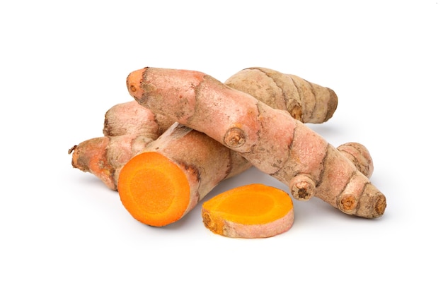 Close-up Turmeric rhizome cutting isolated on white