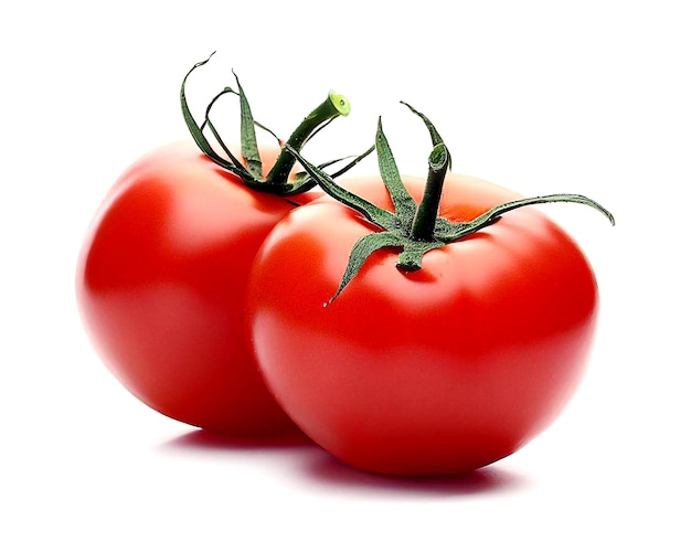 A close up of two tomatoes on a white background