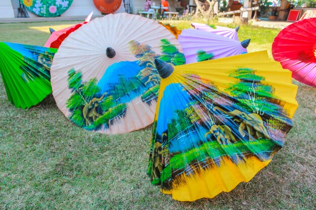 Photo close-up of umbrellas on field