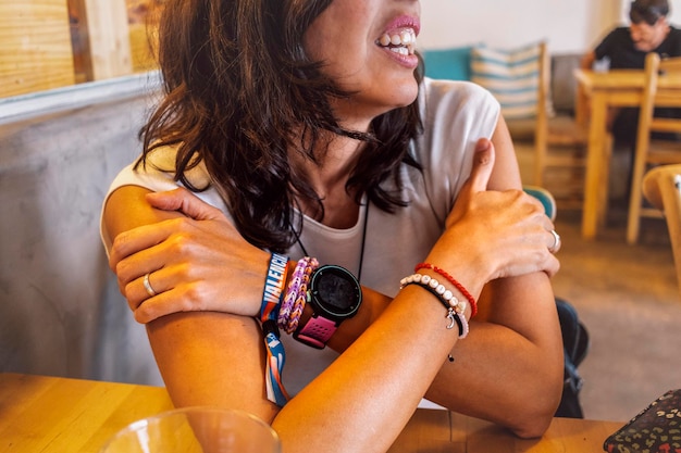 Close up of an unidentified woman wearing a smart wrist watch