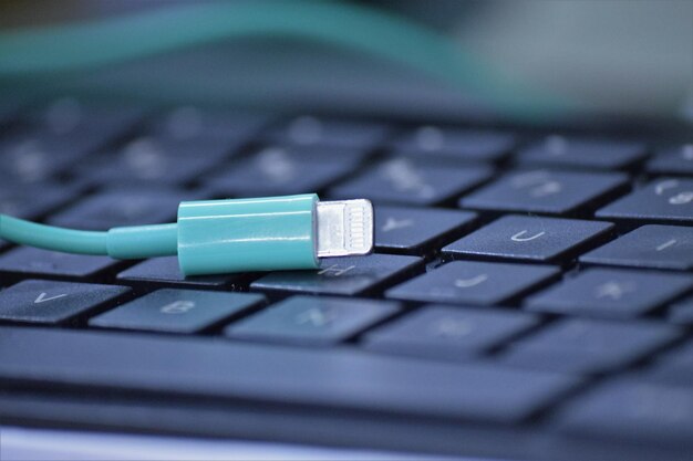 Photo close-up of usb cable on keyboard