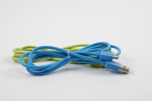 Close-up of usb cables over white background