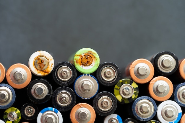 Close up of used battery with corrosion and rust