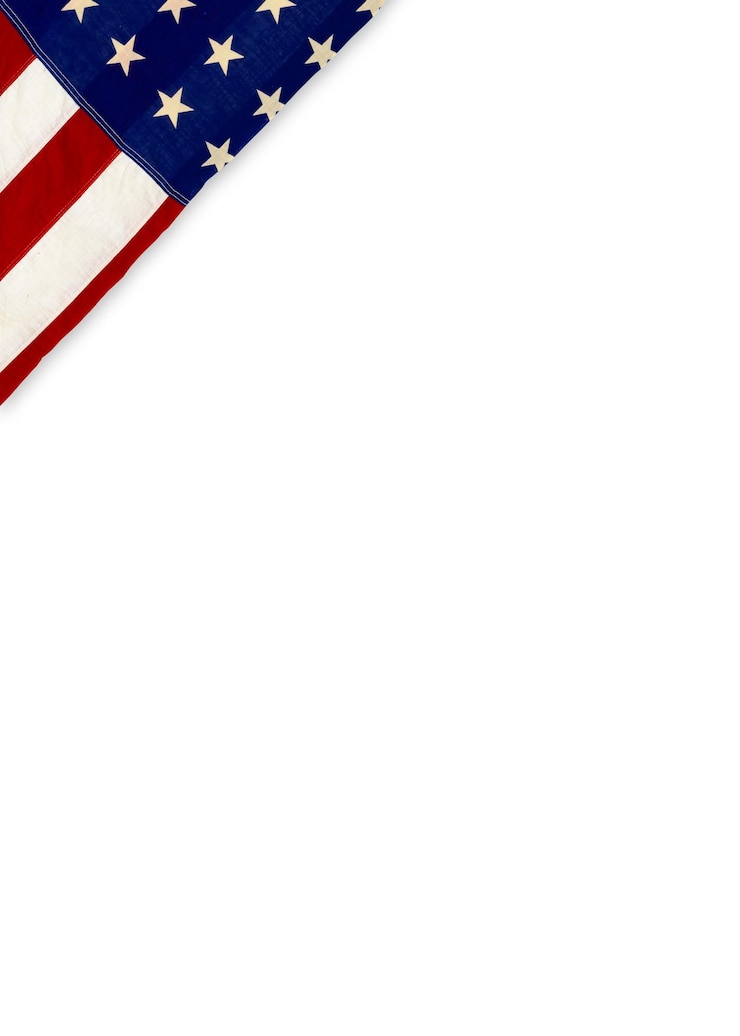 Foto close-up van de amerikaanse vlag op witte achtergrond