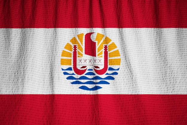 Close-up van de ruffled vlag van frans-polynesië, frans-polynesië vlag waait in de wind