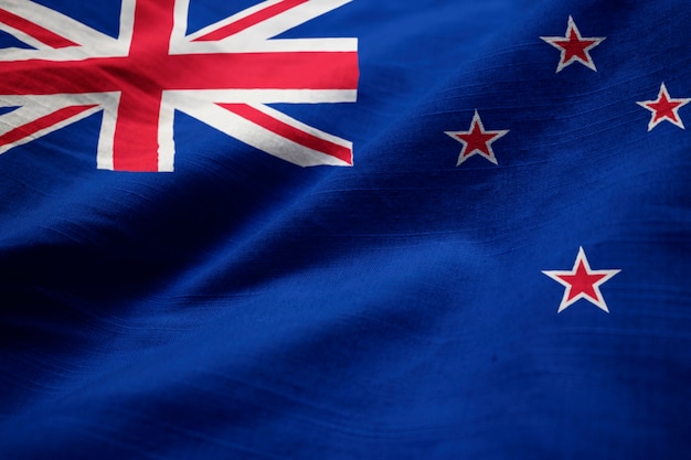 Close-up van de Ruffled Vlag van Nieuw Zeeland, de Vlag die van Nieuw Zeeland in Wind blaast