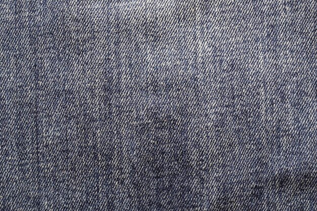 Close-up van de stof achtergrond en denim textuur