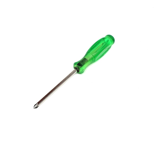 Close-up van een groene schroevendraaier op een witte achtergrond