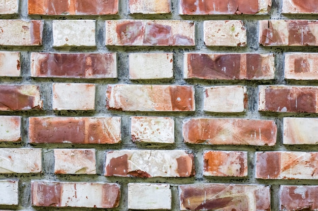 Close-up van een nieuw gebouwde muur met bakstenen patroon