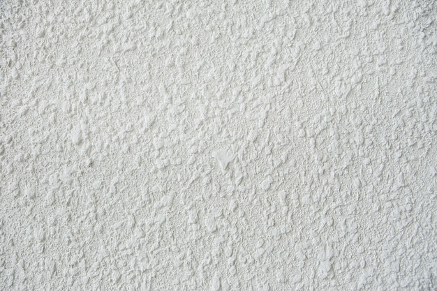 close-up van een witte stucwerk muur