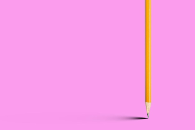 Foto close-up van gekleurde potloden tegen een roze achtergrond