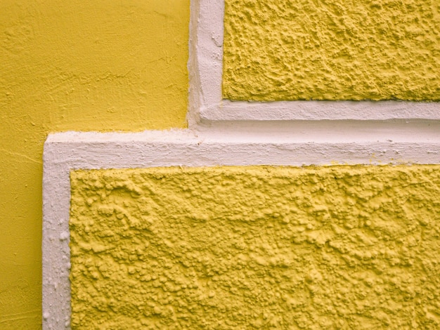Close-up van gele muur