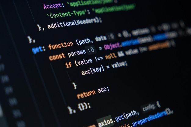 Close-up van het computerscherm met kleurrijke javascript code focus op functie en return sleutelwoorden softwareontwikkeling en codering