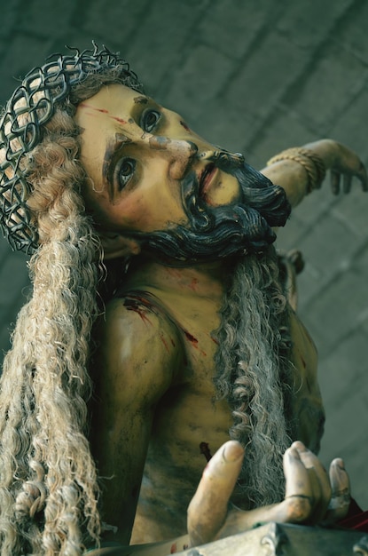 Close-up van Jezus Christus tegen de muur