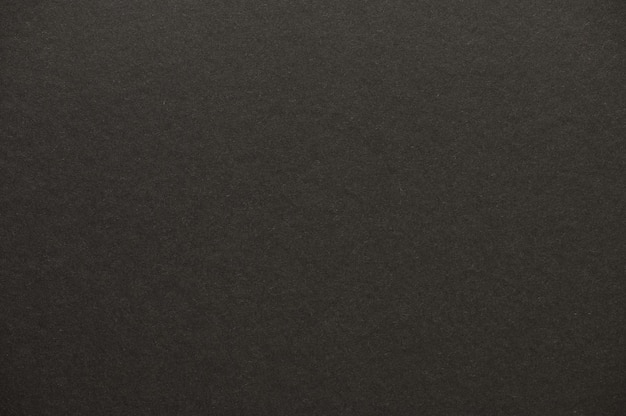 Close-up van naadloze zwart papier textuur voor achtergrond of kunstwerken