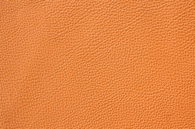 close-up van oranje of bruin lederen blad textuur achtergrond
