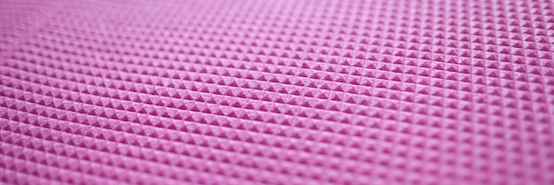 Close-up van roze rubberen yogamat achtergrond