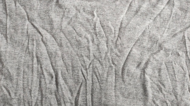 Close-up van verfrommelde verwarming en sportkleding of hoodie met gestructureerde stoffen achtergrond