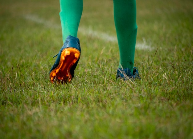 close-up van voetballersschoenen