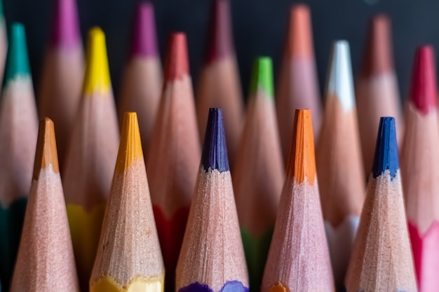 Close up on various colored pencils tips