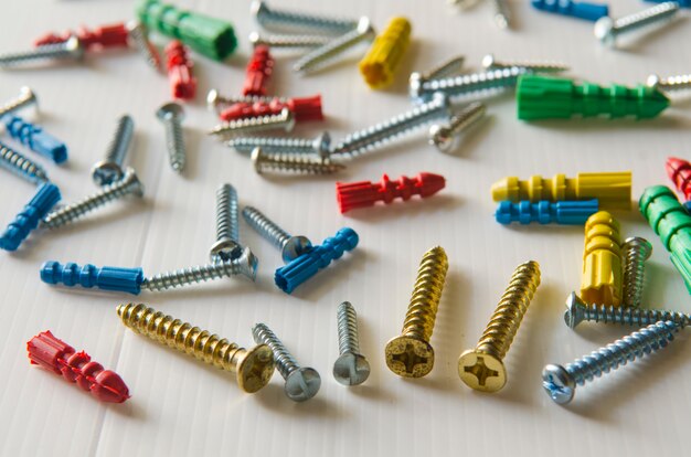 Close-up of various steel nuts