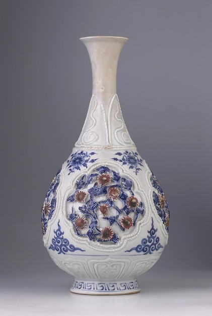 close-up of vase on table against gray background